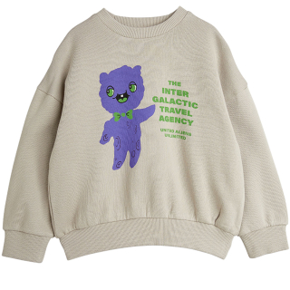 Beige Mini Rodini sweater voor kinderen met grote alien print op de voorkant.