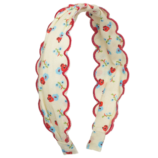 Rockahula Martha Ditsy haarband in creme met bloemenprint, rode schulprand en een knoopdetail.