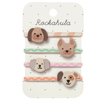 Set van vier Rockahula Pippy Puppy haarelastiekjes met verschillende hondengezichtjes in bruin, beige en pastelkleuren.