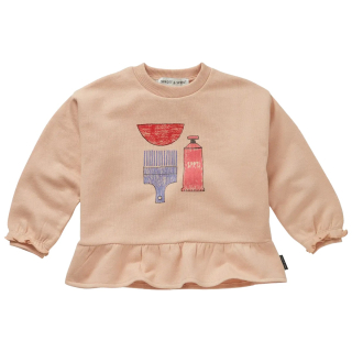 Sproet & Sprout Sweater Ruffle Beige in de kleur Vanilla met creatieve print op de borst en speelse ruffle aan de onderzijde.