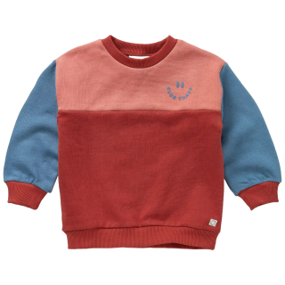Sproet & Sprout Sweater Colourblock Rood Blauw Palette voorkant met colourblock design, blauwe mouwen en Club Chaos-logo op de borst.